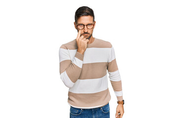 Sticker - Handsome man with beard wearing casual clothes and glasses pointing to the eye watching you gesture, suspicious expression