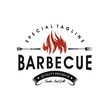 Vintage Grills barbecue with fork and fire flame logo design vector template
