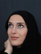 © .shock - Portrait of modern young muslim woman in black abaya