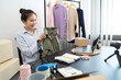 ecommerce and delivery service concept. Asian woman retail online