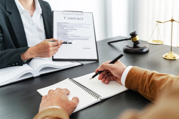 Wall Mural - Lawyer preparing to sign a contract reading documents at meeting