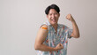 © ChayTee - Adult mature attractive handsome asia hipster male after shot receive covid-19 anti virus vaccine in campaign vaccination safe life happy smile cheerful with bandage on arm with copy space.