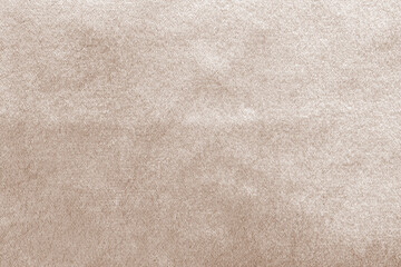 Beige gold velvet background or velour flannel texture made of cotton or wool with soft fluffy velvety satin fabric cloth metallic color material