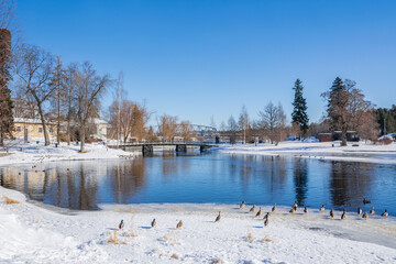 Wall Mural - View to The Lake Saimaa and bridge to The Olavinlinna Castle from the shore in winter, Savonlinna, Finland