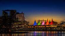 Blue Hour After The Sun Has Set Over The Harbor And The Colorful Sails Of Canada Place, The Cruise Ship Terminal And Convention Center On The Waterfront Of Vancouver, British Columbia, Canada