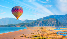 Hot Air Balloon Flying Over Iztuzu Beach In Dalyan, Turkey