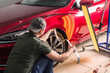 Removing dents on the car. PDR technology. Car body repair without painting.