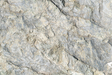 Wall Mural - Stone texture abstract background. Detail of natural material gray granite old rock wall