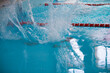 © Светлана Лазаренко - A man is swimming in the sports pool
