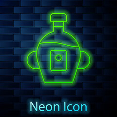 Sticker - Glowing neon line Bottle of maple syrup icon isolated on brick wall background. Vector