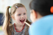 © H_Ko - Otorhinolaryngologist doctor examining sore throat little girl in clinic