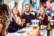 canvas print picture - Happy friends having fun drinking white wine at street food festival - Young people eating local plate at restaurant reopening together - Travel and dinning lifestyle concept on azur light neon filter