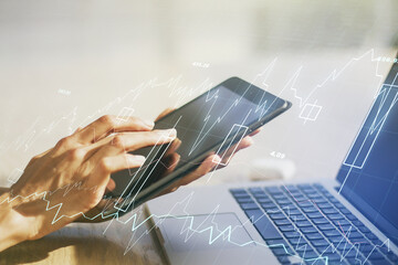 Multi exposure of abstract creative financial chart with finger presses on a digital tablet on background, research and analytics concept