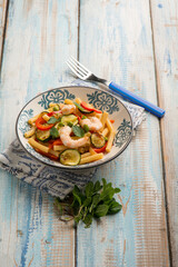 Canvas Print - pasta with shrimp zucchinis tomato and green peas