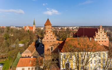 Wall Mural - Castle of the Warmian Chapter in Olsztyn and the garrison church of Our Lady Queen of Poland in Olsztyn