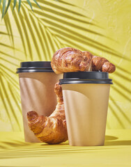 Wall Mural - Take away coffee and fresh croissant