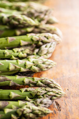 Sticker - Fresh raw uncooked green asparagus.