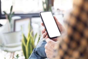 cell phone blank white screen mockup.woman hand holding texting using mobile on desk at office.background empty space for advertise.work people contact marketing business,technology