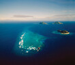 © SuperStock - Aerial of a group of pacific atolls and reef - part of the Fiji Island group