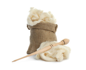 Wall Mural - Soft wool in sack and spindle on white background