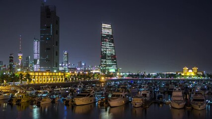 Wall Mural - Abu Dhabi city skyline with skyscrapers before sunrise from above night to day timelapse