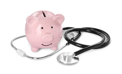 Poster - Piggy bank and stethoscope on white background