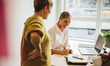 © Jacob Lund - Two business woman discussing new strategy in meeting
