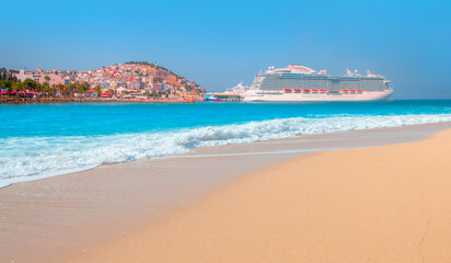 Wall Mural - The cruise ship is located on Kusadasi Island in the port of Kusadasi, Turkey