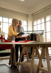 Wall Mural - Muslim women run a small business in their own homes