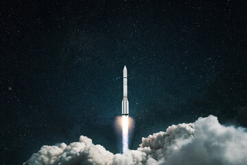 Fototapete - Spaceship launch into space. Rocket takes off in the starry blue sky