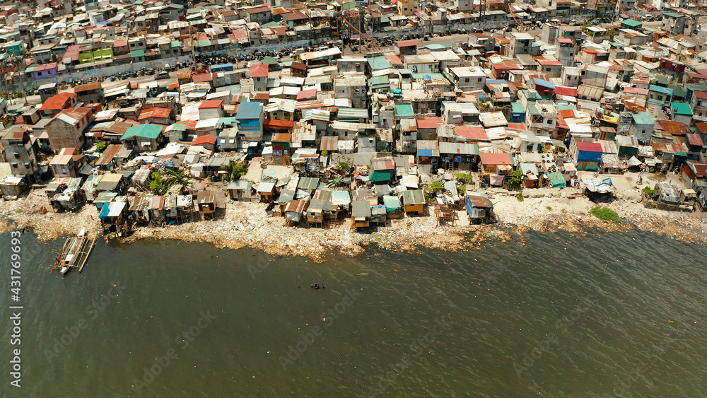 Poor district and slums in Manila with shacks and buildings. Manila ...