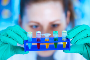 Canvas Print - Young female laboratory assistant in laboratory analyzing environmental pollution