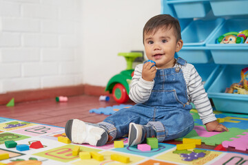 baby playing in house