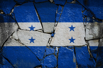 Wall Mural - National flag of Honduras. depicting in paint colors on an old stone wall. Flag  banner on broken  wall background.