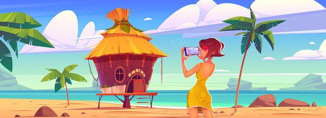 Wall Mural - Girl take photo of landscape with bungalow, sea and palm trees. Vector cartoon illustration of woman photographs ocean beach with resort wooden house on mobile phone camera