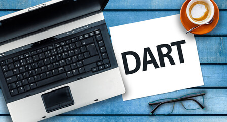 dart programming language. word dart on paper and laptop
