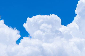 Wall Mural - white fluffy clouds on blue sky. soft touch feeling like cotton. white puffy cloudscape. beauty in n