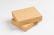 © katestudio - Two cardboard boxes lying on each other on a light background. Packaging, gift. Mock up. 3d rendering