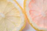 Fototapeta Kuchnia - Yellow and rose Lemon Slices - macro detail, on white background. Multicolor Citrus fruit.