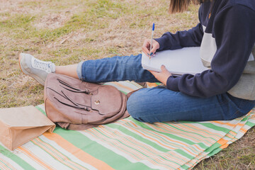 Wall Mural - For a young university student to study for the exam she must take at the university.