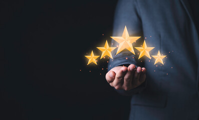 Poster - Businessman holding virtual five stars for customer feedback rating and evaluation concept.