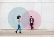 © Emma Innocenti/Westend61 - Graphic visualization of data exchanged by man and woman using smart phones outdoors
