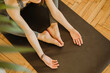 © Gerard Moral Casanovas/Westend61 - Woman exercising yoga on mat at home