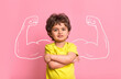 © shara - Strong little man child with bicep muscles picture. Concept for strength, confidence or defense from bullying. Kindergarten or school kid. Strong boy