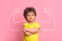 Strong Little Man Child With Bicep Muscles Picture. Concept For Strength, Confidence Or Defense From Bullying. Kindergarten Or School Kid. Strong Boy