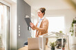© Uwe Umst√§tter/Westend61 - Female entrepreneur making video call through digital tablet while sitting on desk at home