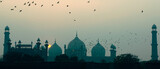 Fototapeta  -  Sunset and birds with Badshahi Masjid Lahore