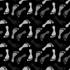 Grey human footprints silhouette paths on black background. Clip-art vector illustration. Seamless pattern.