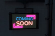 © mego-studio/Westend61 - Illuminated coming soon sign on black wall