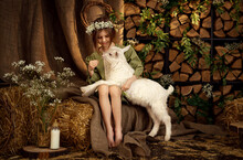 Cute Farm Girl Hugs And Feeds Her Little White Goat 
